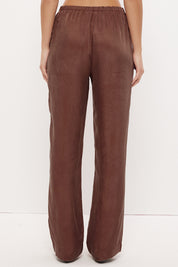 Mid-rise relaxed fit straight leg pants in brushed woven fabric with exclusive handcrafted print