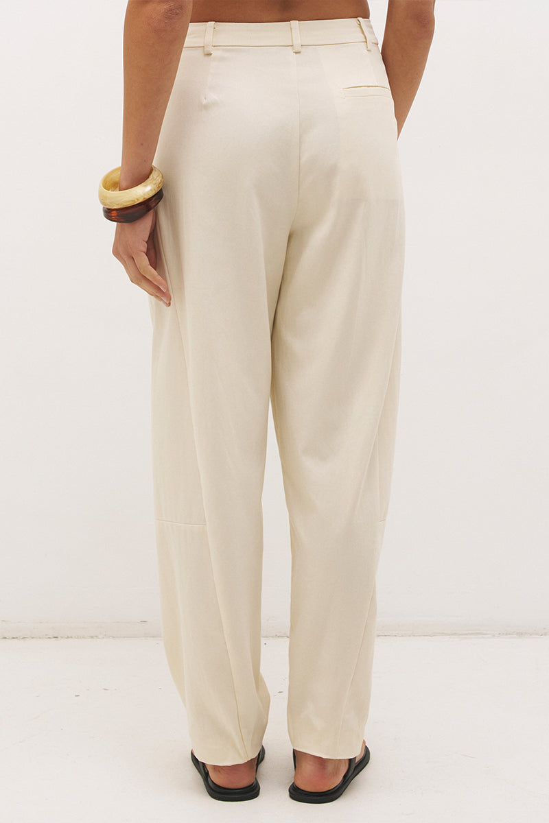 Cotton twill barrel leg pants with mid-rise fit, drawstring waist and structured panel detailing