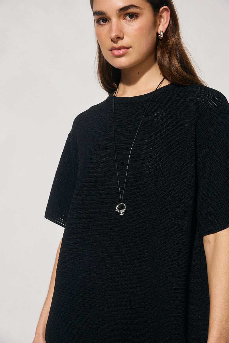 Oversized knitted tee shirt with round neckline and ribbed neck band in soft viscose-blend knit