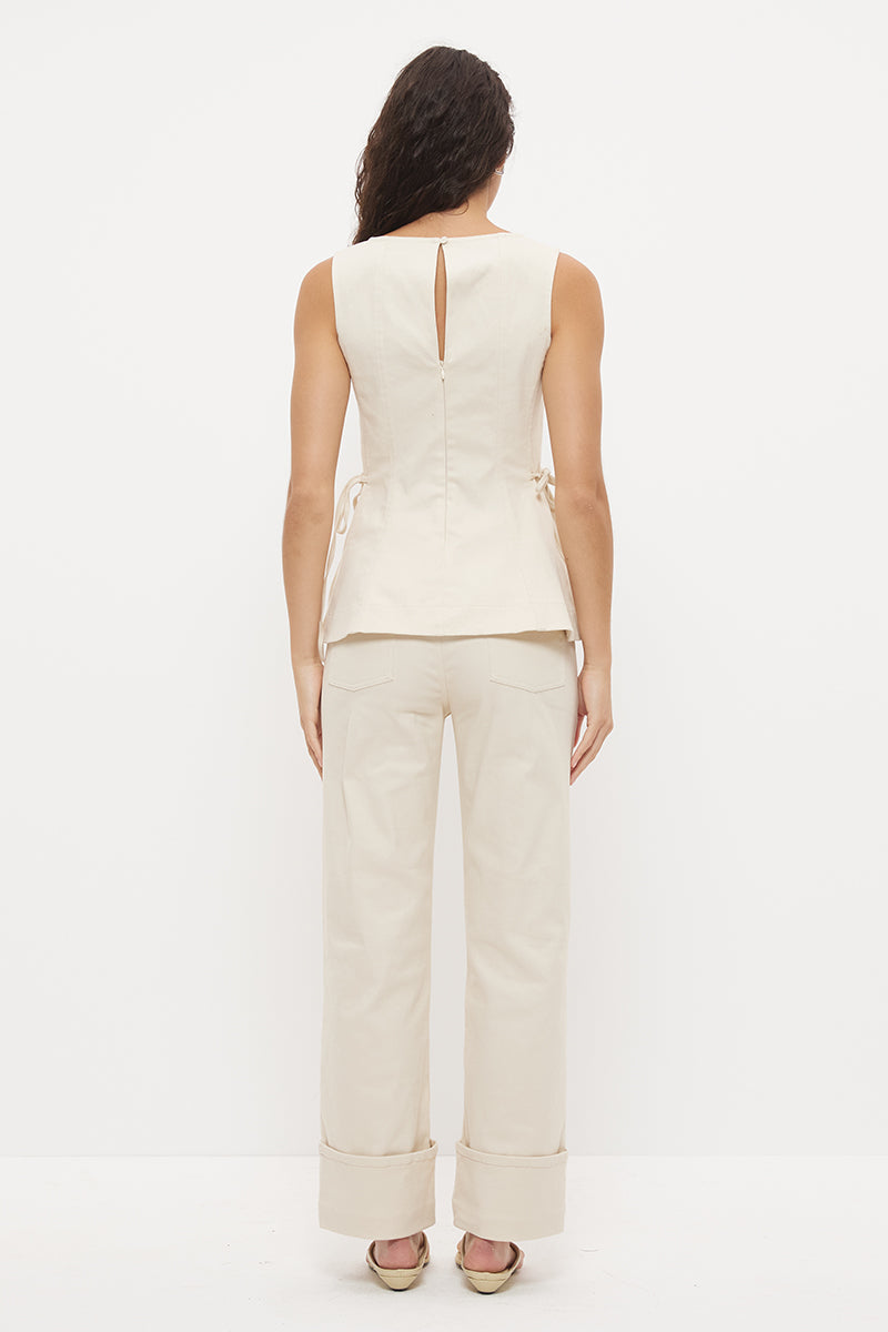 Sleeveless denim top with fit and flare silhouette, square neckline and circle cut flared hemline