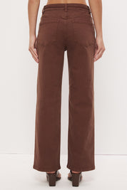 Mid-rise straight leg denim jeans with narrow waist tie and rivet detailing