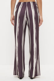 Mid-rise relaxed fit straight leg pants with drawcord waist in exclusive handcrafted print