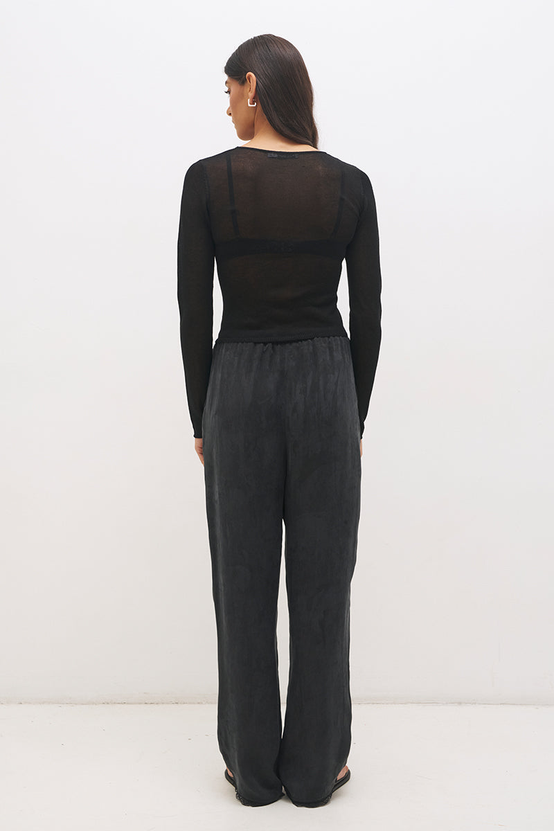 Semi sheer knitted long sleeve top with floral appliqué, jewel neckline and skimming fit