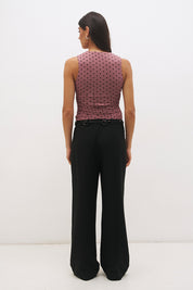 Rosewood and black sleeveless flocked polka dot mesh midi dress with plunging V-neckline, empire seam and A-line skirt