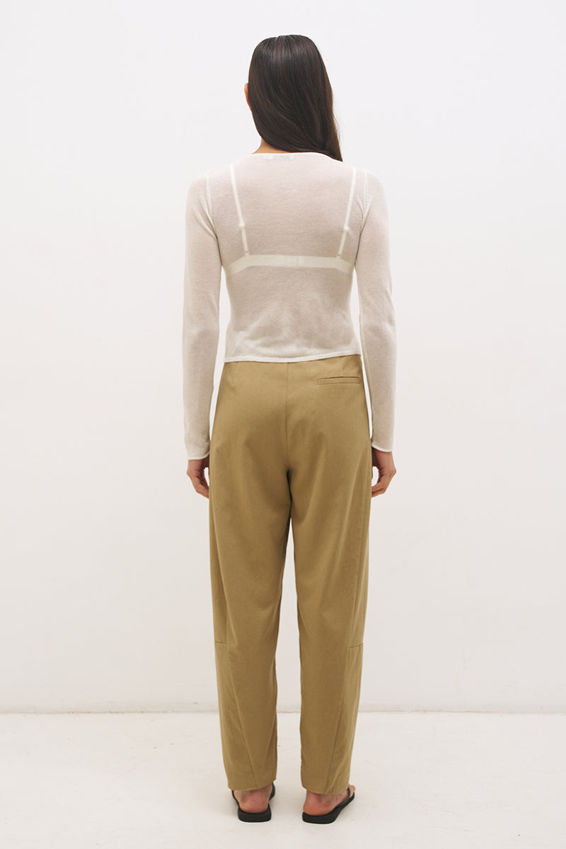 Semi sheer knitted long sleeve top with floral appliqué, jewel neckline and skimming fit
