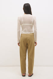 Semi sheer knitted long sleeve top with floral appliqué, jewel neckline and skimming fit