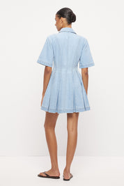 Light wash denim shirt mini dress with fit and flare silhouette, inverted pleats and contrast topstitching