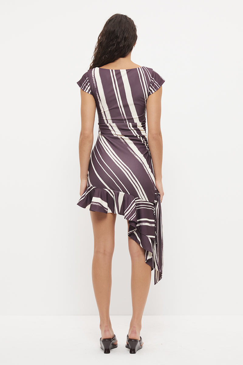 Cap sleeve mini dress with boat neckline, waist ruching and layered flounce hem in exclusive handcrafted print