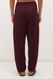 Cotton twill barrel leg pants with mid-rise fit, drawstring waist and structured panel detailing