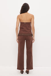 Strapless denim top with A-line silhouette and scallop lace trim hemline