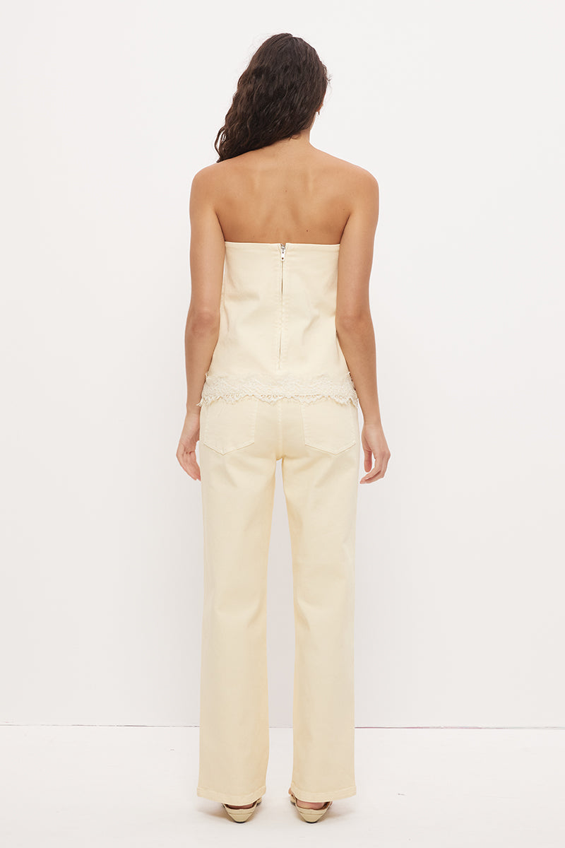Strapless denim top with A-line silhouette and scallop lace trim hemline