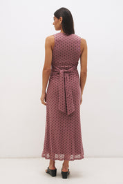Sleeveless flocked polka dot mesh top with plunging V neckline, empire line seam and ruched fitted silhouette