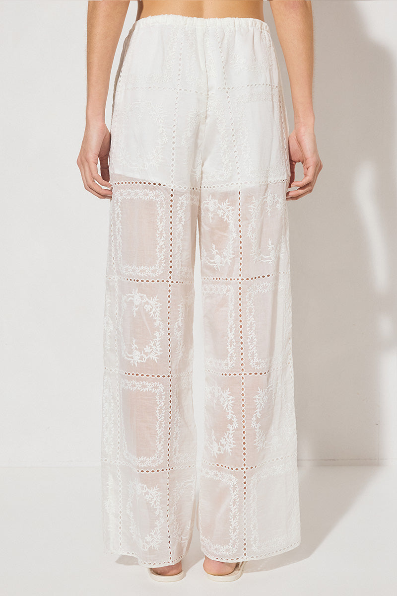 ELOWEN Relaxed Drawstring Pants in semi-sheer embroidered fabric with wide-leg silhouette, elasticated waist, drawcord, and side pockets