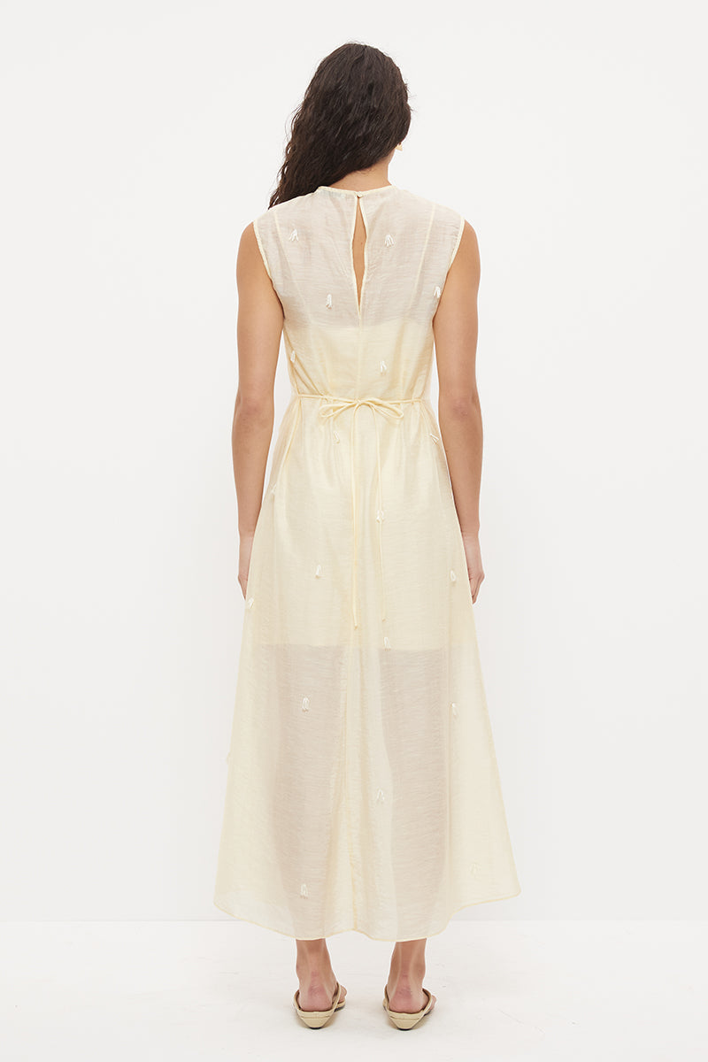 Sheer maxi dress with dropbeading embellishment and jewel neckline over separate slip