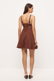 Twist front linen mini dress with sweetheart neckline, empire line fit and contrast cornelli applique