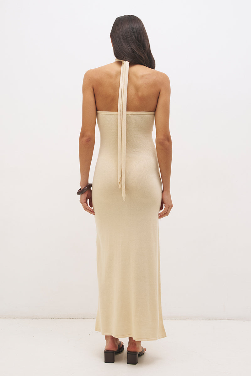 Knitted halter neck maxi dress with floral appliqué, turtleneck band, bodycon bodice and fit and flare skirt