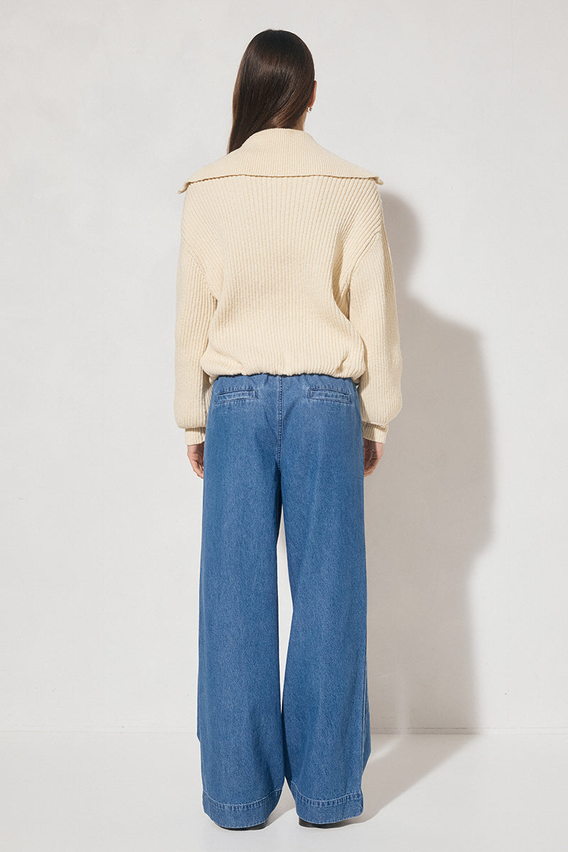 Chunky rib knit bomber jacket with wide dropped shoulders, balloon sleeves, ribbed collar and cuffs, bubble hem with internal elastic, welt pockets, and 2-way metal zipper