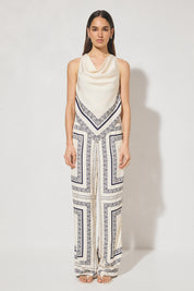 High-waisted tailored woven pants with handcrafted print, straight-leg silhouette, narrow waistband, and side seam pockets